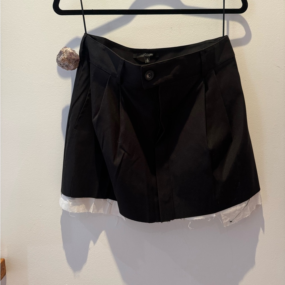 Black mini skirt with long pockets